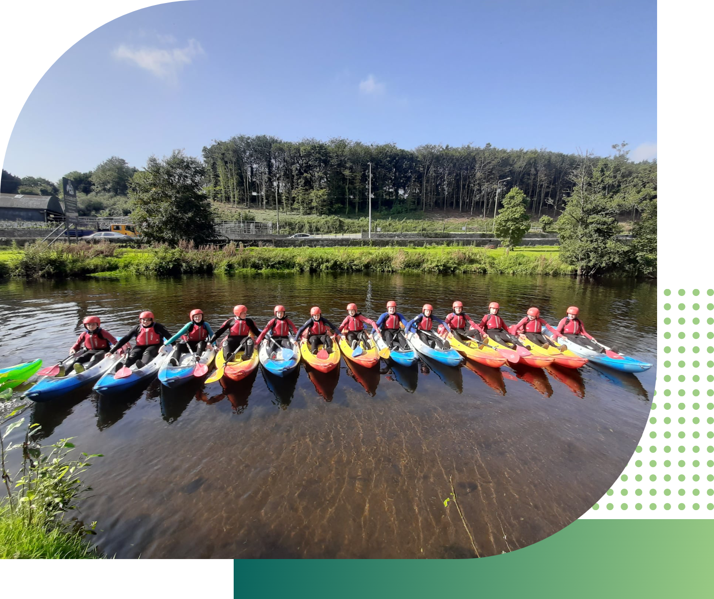 group of students kayaking on river 