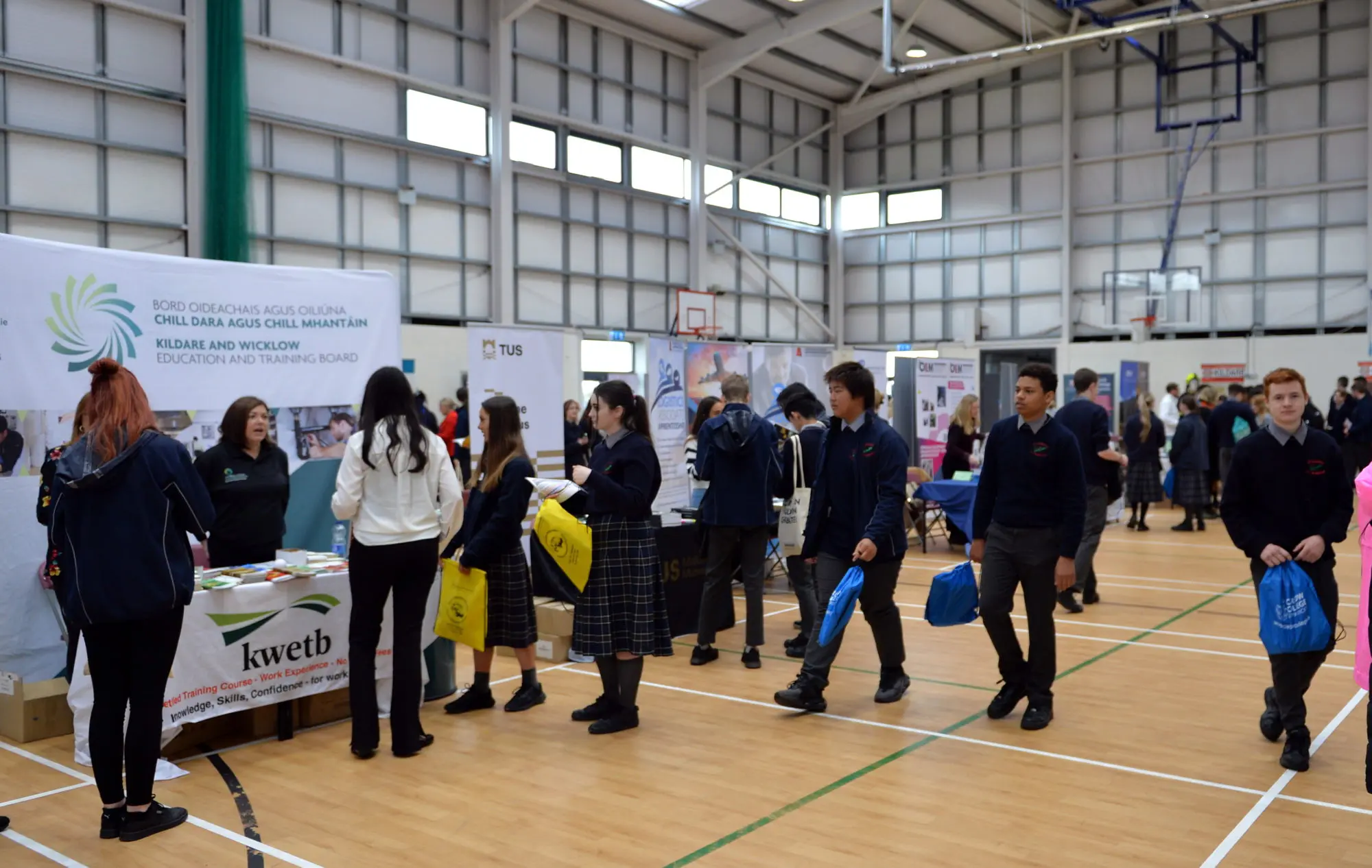 Students walking around the St. Conleth's Community college careers fair 
