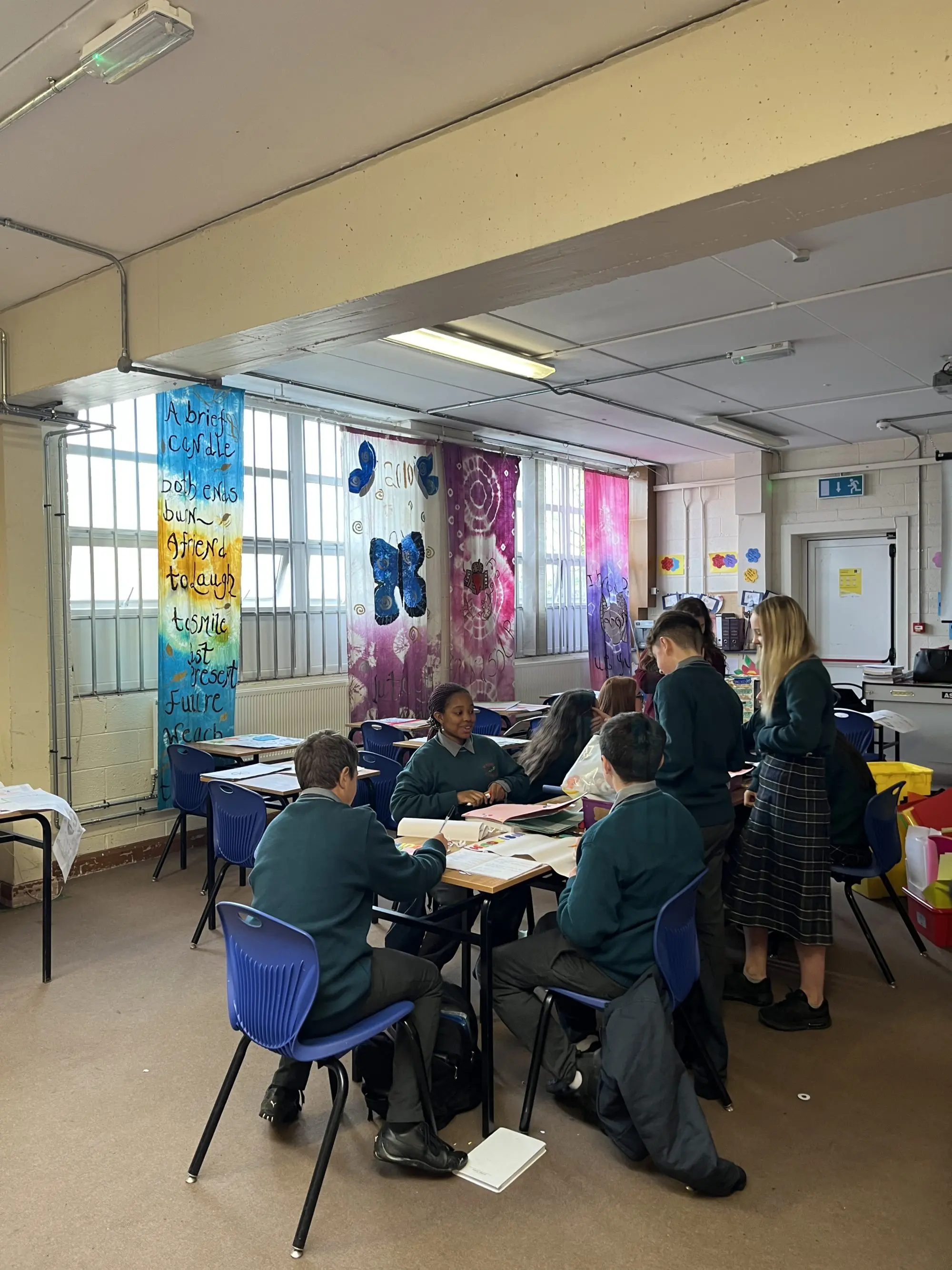 sixth class students at St. Conleths Community College in the art room watching students make their art project 