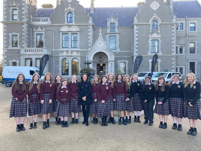 St. Farnan's School choir pictured standing outside the Killashee Hotel in Naas