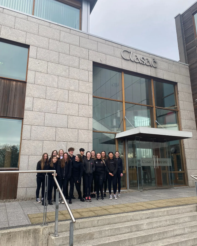 Gaelcholáiste Mhaigh Nuad students standing outside the Clasa Music building in Leinster 