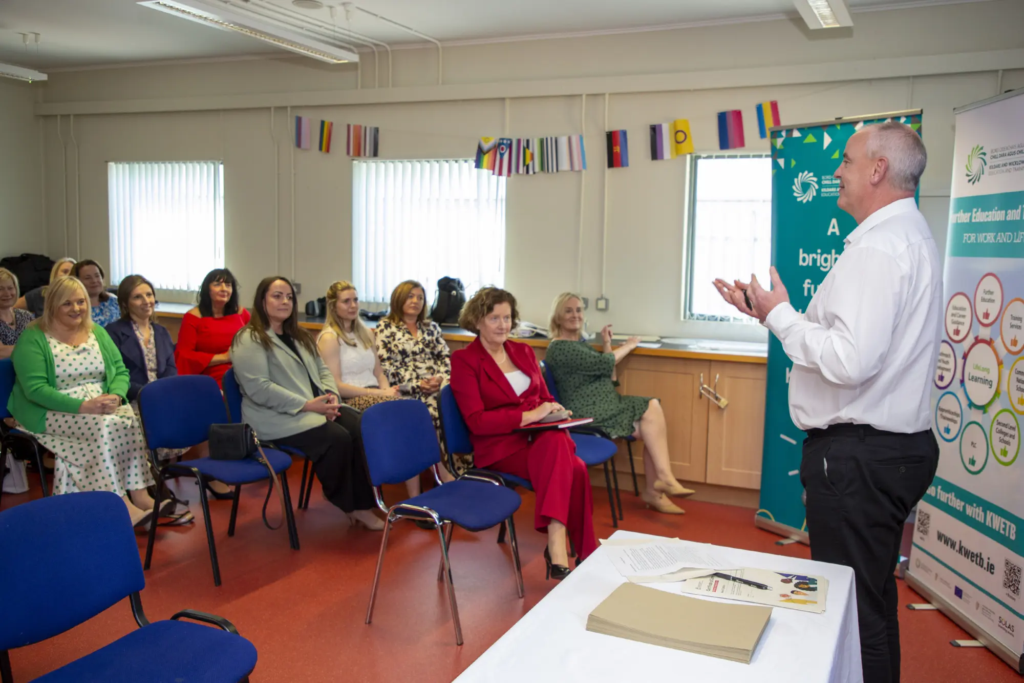 Director of Schools, Ken Scully, speaking to KWETB staff in attendance against a background of KWETB promotional banners at a KWETB Equality, Diversity and Inclusion (EDI) day