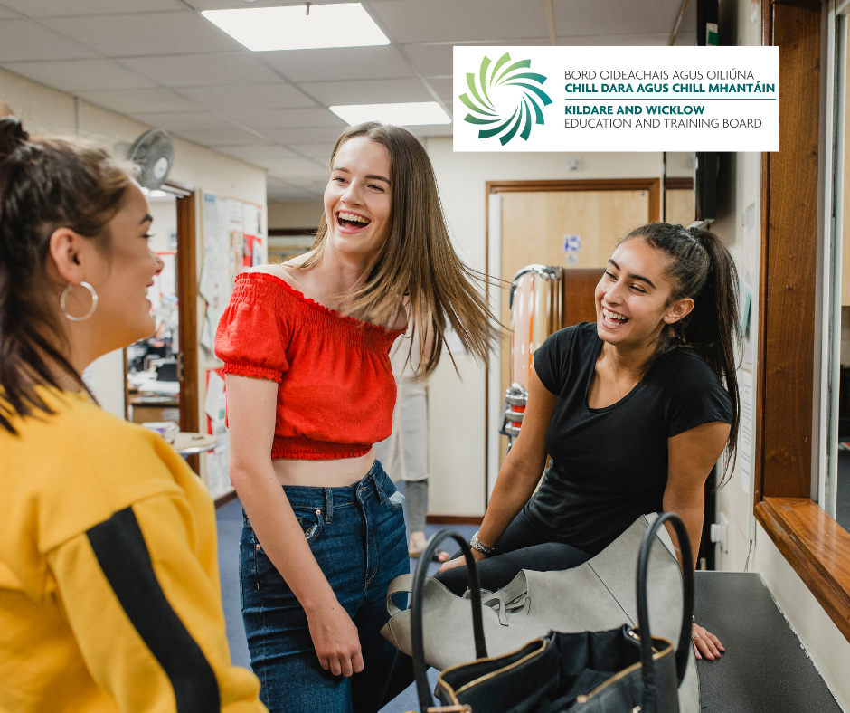 3 females students laughing and smiling