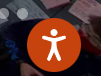 Reachdeck orange man symbol. graphic of a person with arms spread out on an orange background